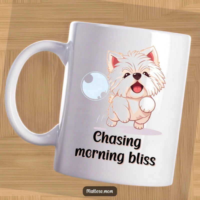 Funny Maltese dog mug depicting a playful white dog delightedly chasing a shimmering bubble.