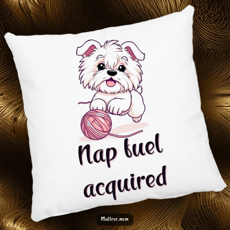 Funny Maltese dog pillow showing a cute character playfully pouncing on a rolling ball of yarn, adding a touch of humor and comfort.
