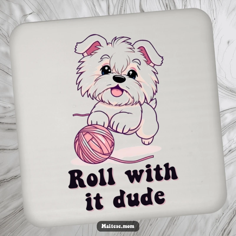 Funny Maltese dog coaster depicting a cute character playfully chasing a rolling ball of yarn, adding a humorous and protective element to tables.