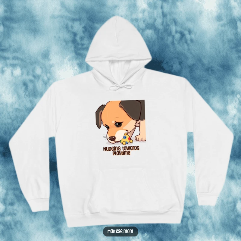 Funny Hoodie with a dog nudging a small, colorful toy with its wet nose, bringing warmth and humorous charm.