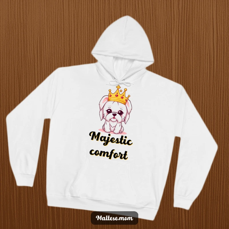 Funny hoodie with a kawaii Maltese dog wearing a tiny crown, exuding regal charm and a hint of amused delight.