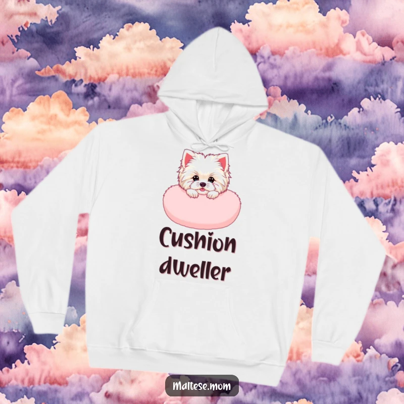 Funny Maltese Lady Hoodie: A Maltese dog peeking from a pink cushion, embodying cozy humor and warmth, a perfect gift.