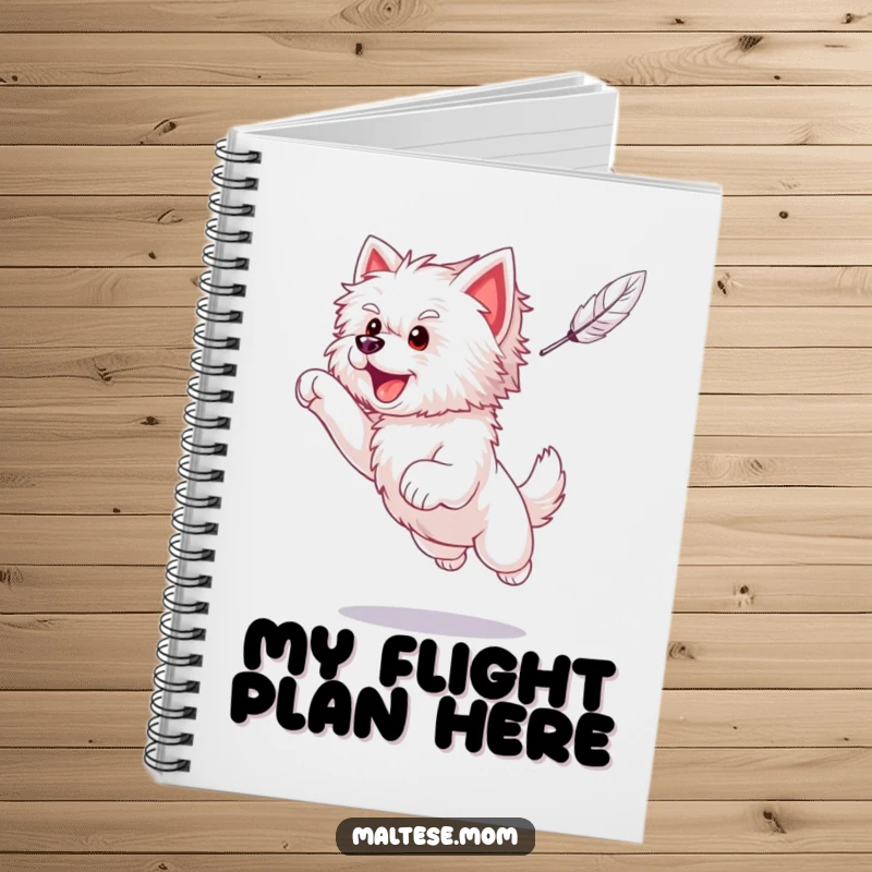 Funny Maltese puppy captured mid-leap, excitedly pursuing a feather, on a notebook cover for playful note-taking.