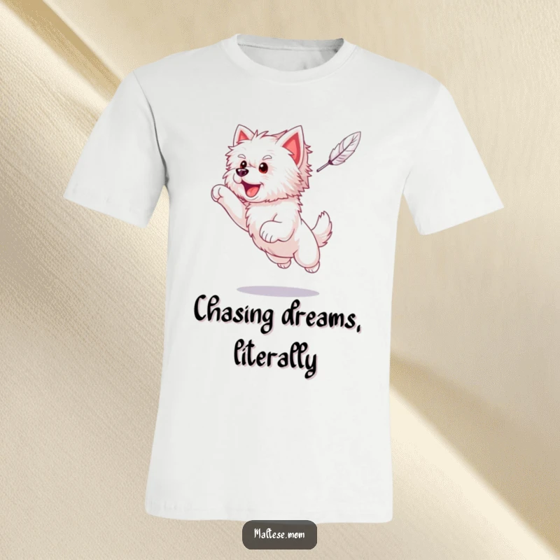 Funny Maltese puppy caught in an energetic leap, reaching for a feather with all its might, on a comical t-shirt.