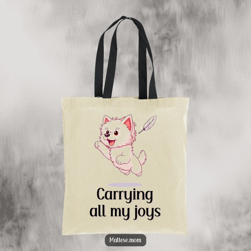 Funny Maltese puppy in mid-leap, enthusiastically chasing a delicate feather, featured on a practical and cute tote bag.